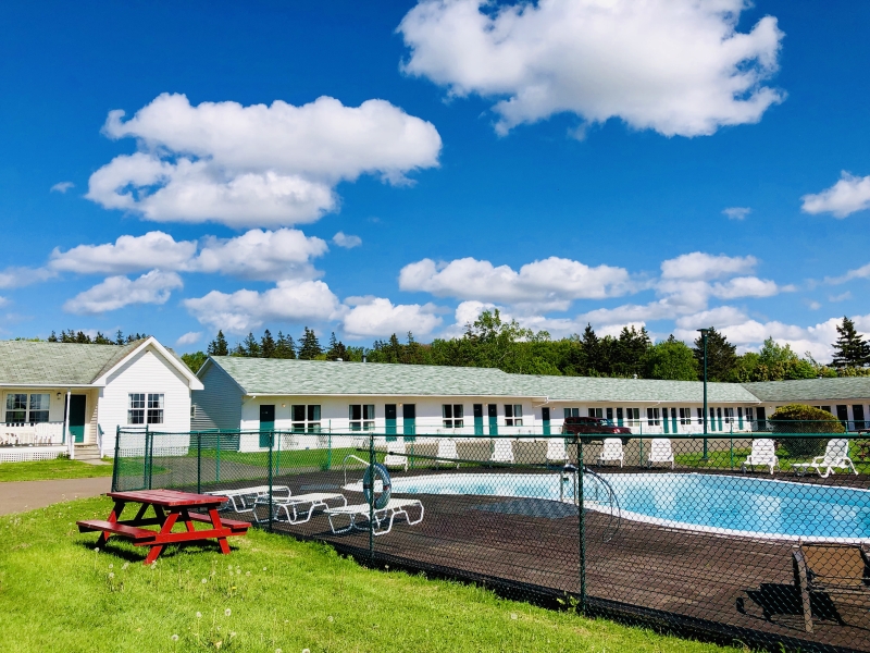 View of outdoor pool at Anne Shirley Motel & Cottages